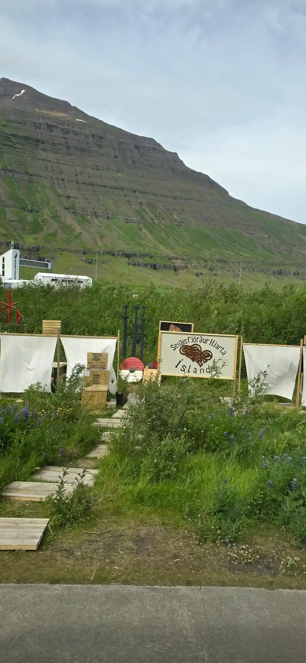 Mountain valley with laundry line and green slopes